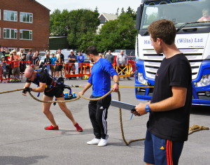 Pulling a lorry at Ironworx Strongman competition