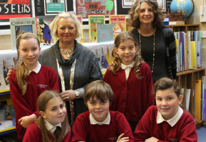Headteacher Judith Finney, deputy head Nina Stiddard, and pupils at Dilton Marsh Primary School