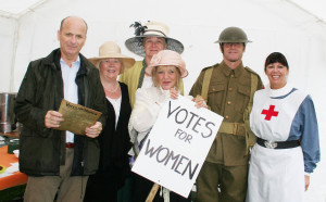 Enthusiasts dressed in costumes from the period including nurses, soldiers, teachers, and others