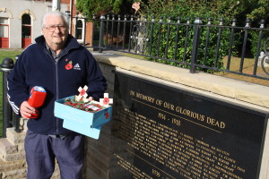 Bill Prior next to the war memorial