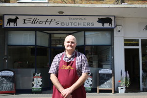 Andrew Elliott outside the new butcher's shop